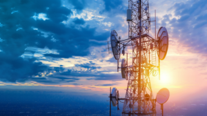 Telecommunications tower with antennas at sunset, representing multi-vendor Open RAN assurance